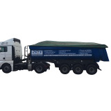 MAN Truck mit Leistungsbeschreibung auf dem Hänger